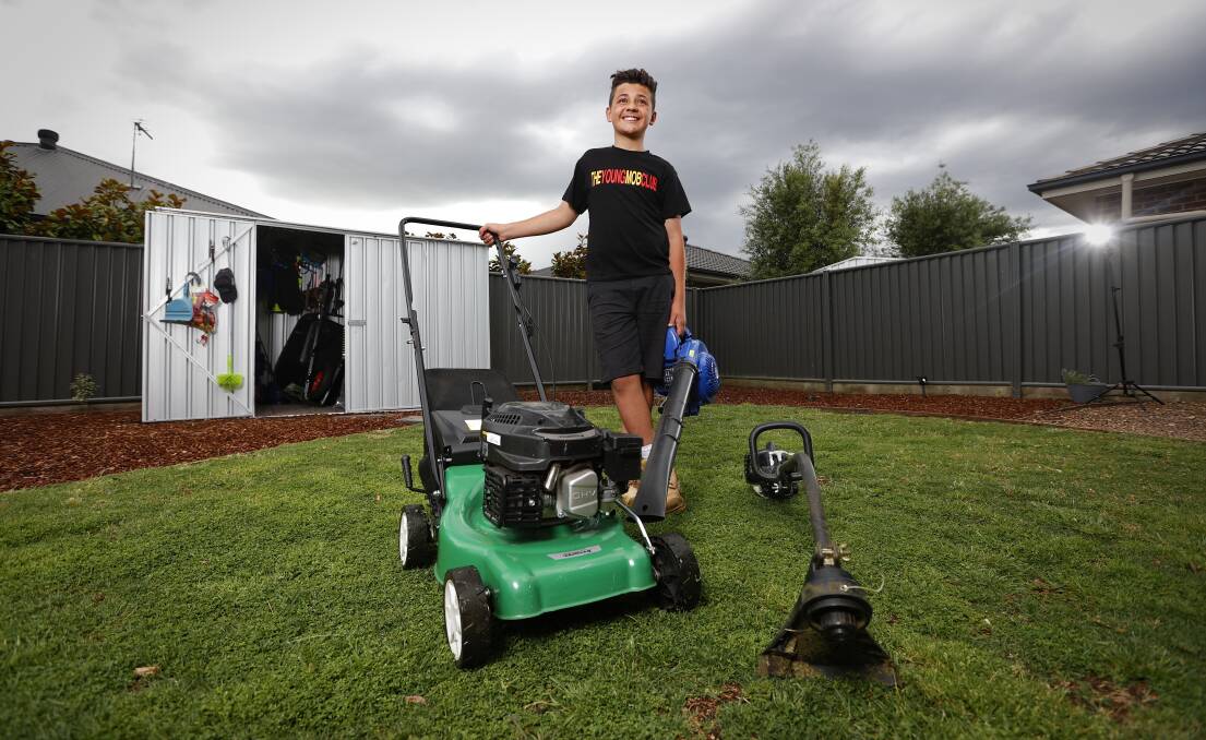 READY: Ryder Tucker is ready for work, mowing at least five lawns a week. Picture: Luke Hemer