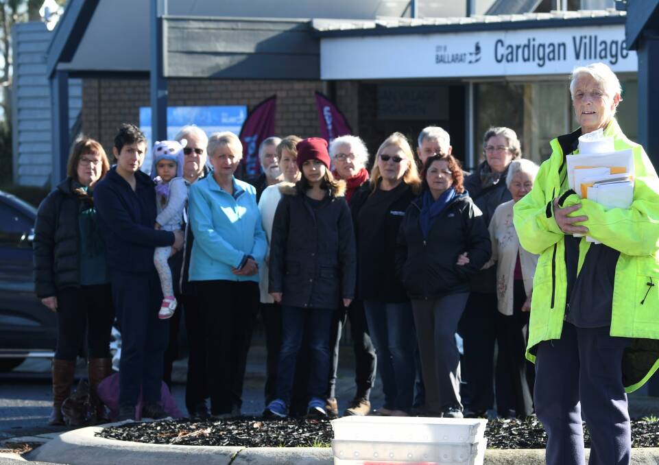 THEN: The Cardigan Village community rallied behind postie Lyn McNeight last month when she was told her mail delivery contract would not be renewed. Picture: Lachlan Bence