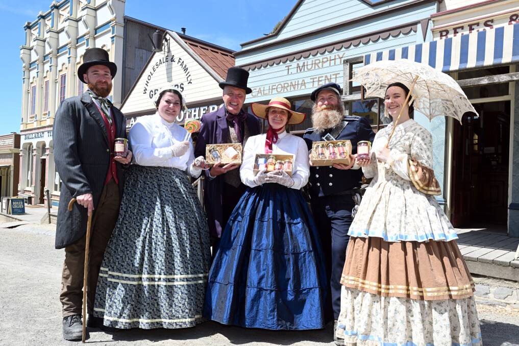 Tim O'Keefe, Lucy McNeil, David Hollywood, Claire Brown, Paul Elliott, and Kirily Mortem with some of the products that will be available at Sovereign Hill's annual Christmas Shopping Night on November 24. Picture by Kate Healy