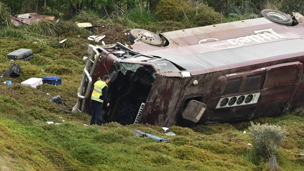 The bus after the rollover. Image: AAP