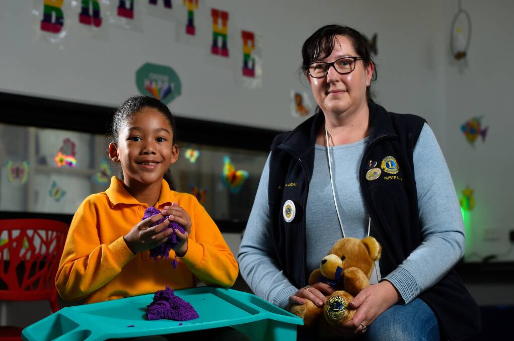 DONATION: Harley, 7, with Alfredton Lucas Lions Club president Michelle O'Brien. The Lions Club donated $2000 to Alfredton Primary School for their sensory room, in addition to a similar grant last year. Picture: Adam Trafford