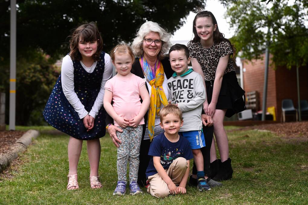RETIRING: Brown Hill Kindergarten teacher Christine Sullivan with current and former pupils Melissa, Rosie, Lucas, Henry, and Bethany during a celebration to mark her retirement after 14 years at the kinder, which included the introduction of its bush kinder program. Picture: Adam Trafford 