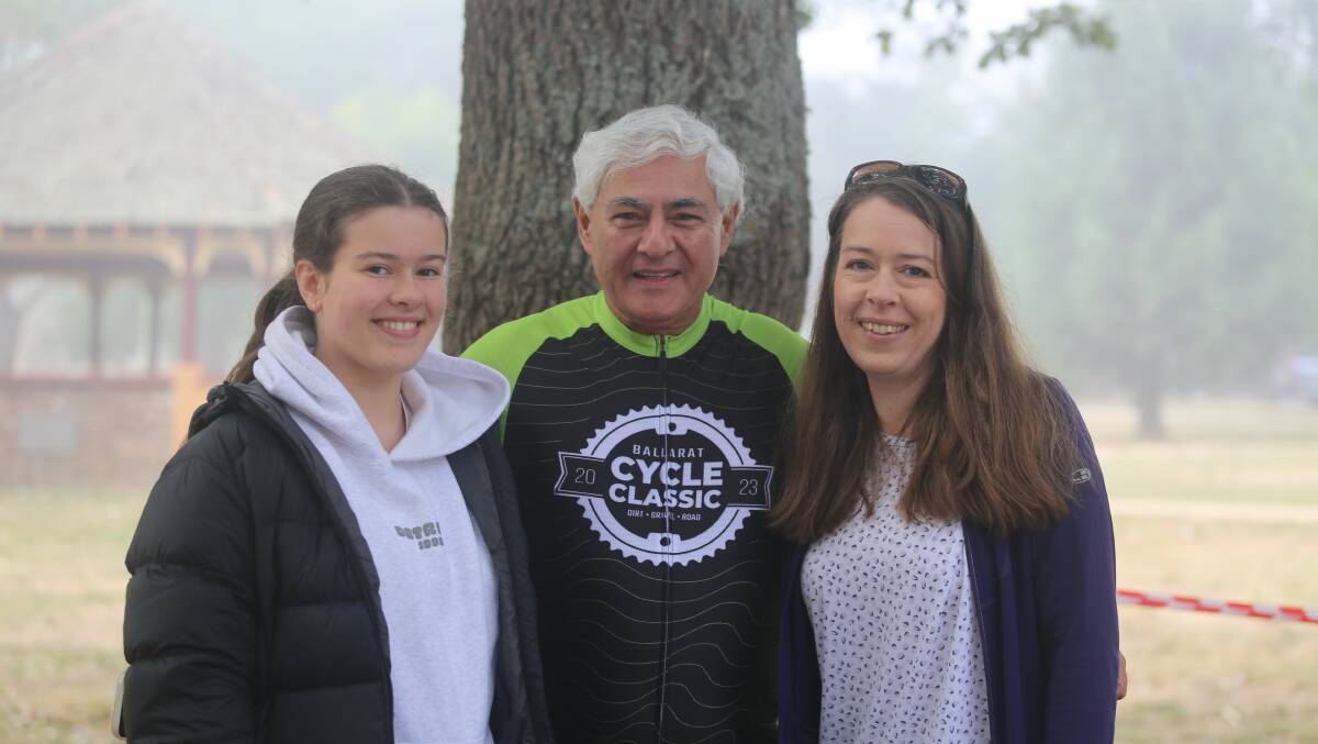 FECRI director Professor George Kannourakis with volunteers Zoe and Karli Timothy at the Ballarat Cycle Classic on Sunday. Picture by Michelle Smith