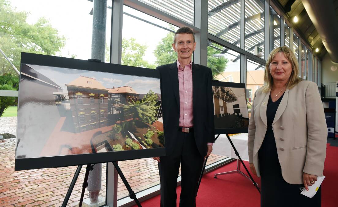 PLANS: Federation University vice chancellor Duncan Bentley and higher education minister Gayle Tierney with an architects image of the new Business Centre of Excellence. Picture: Kate Healy