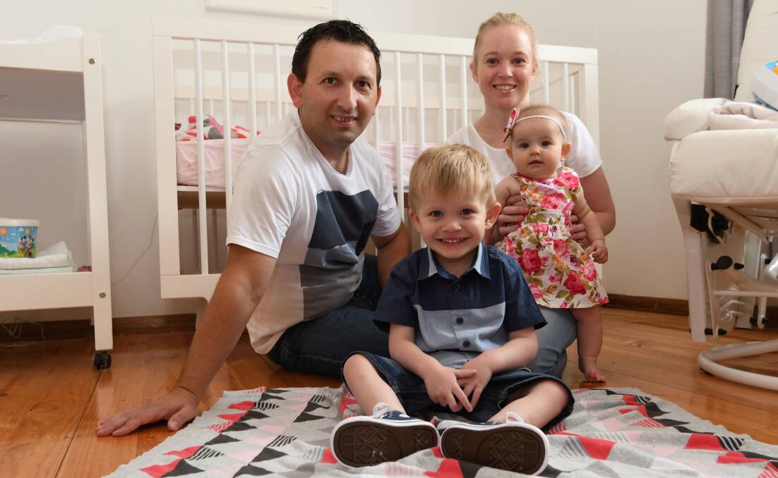 FAMILY: Mihalis with his family - dad George, mum Michelle and baby sister Chloe, six months. Picture: Lachlan Bence