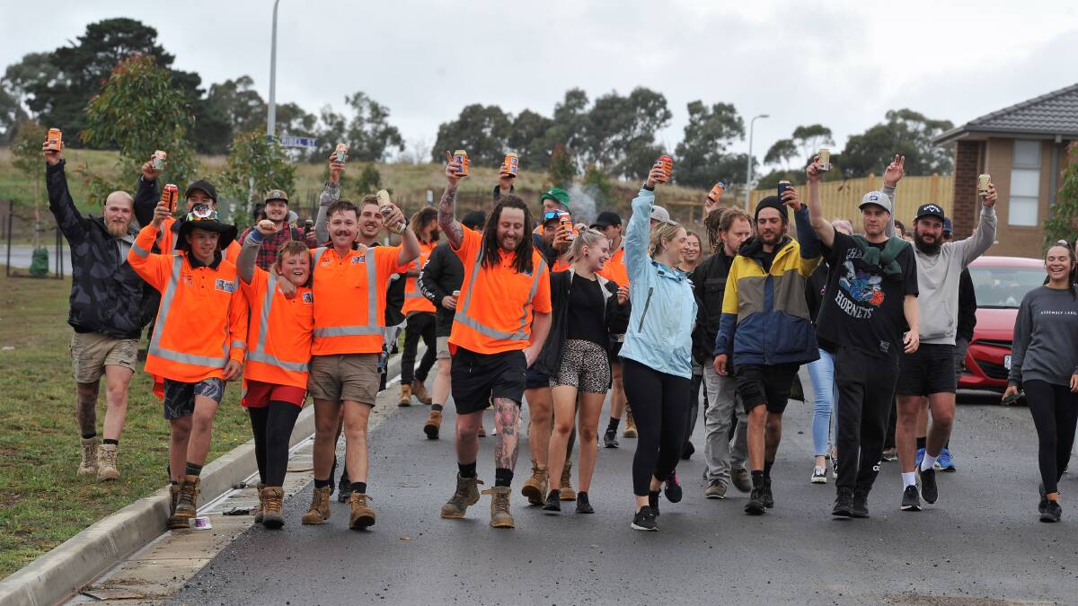 END IN SIGHT: The Regional Workers Memorial Fund walk cover the final metres of their trek from Geelong to the site of a new memorial park near the site of the trench collapse in Delacombe. Picture: Lachlan Bence 