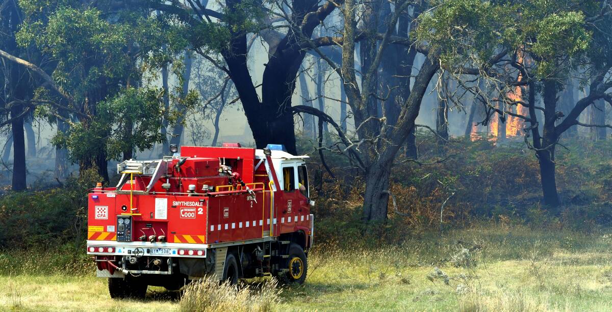 FIRE: CFA crews fight a fire at Monkey Gully near Scarsdale last summer. Picture: Lachlan Bence