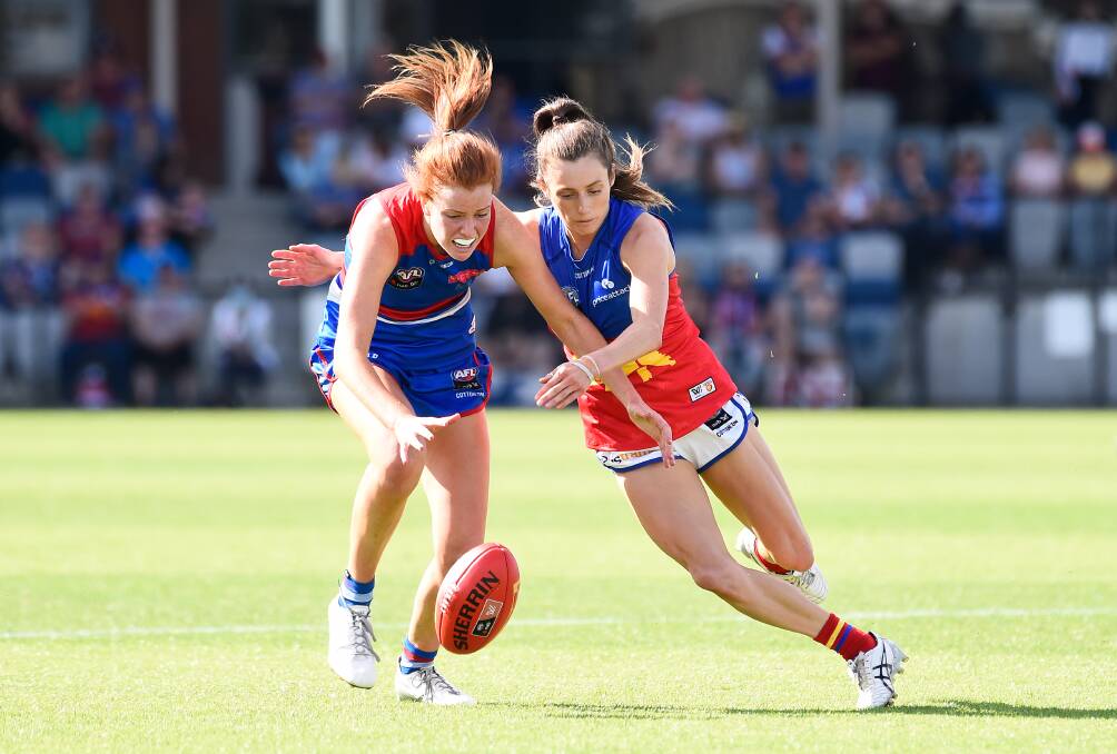 EYES FOR THE BALL: Western Bulldog Eleanor Brown and Brisbane Lion Shannon Campbell go for the ball during an AFLW match at Mars Stadium. Pictures: Adam Trafford