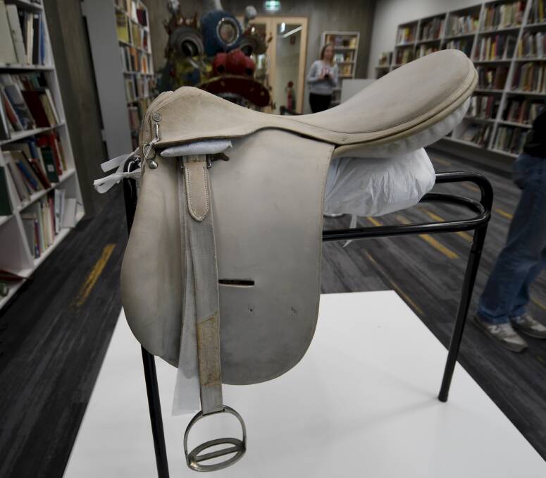 The original TW Purdue saddle presented to rider of the winning horse in the Grand National Steeplechase at Flemington in 1895. Picture by Lachlan Bence
