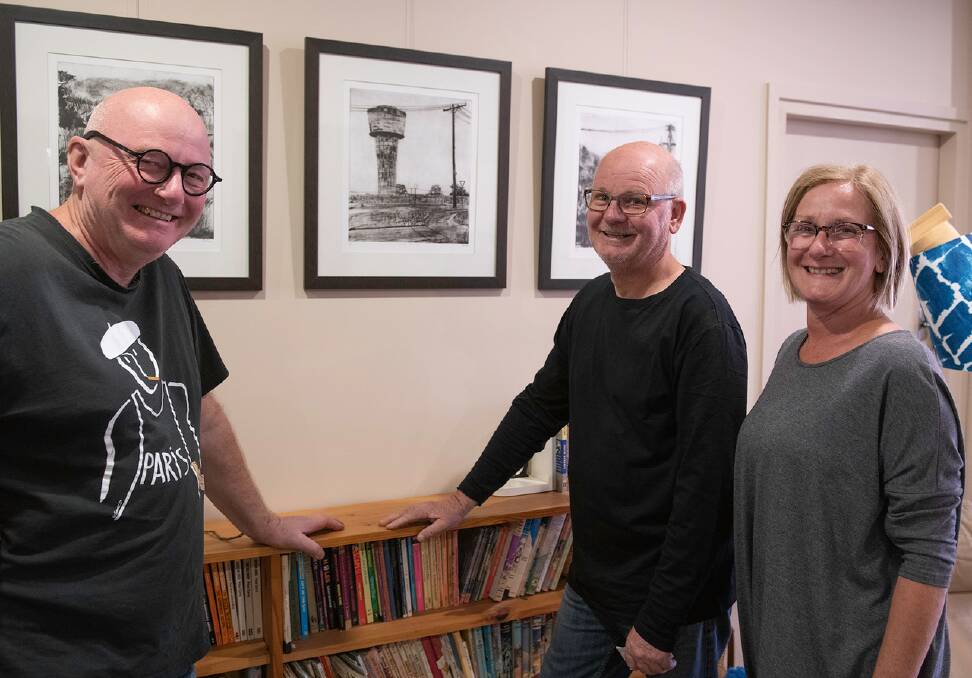 Cliff Adeney, Helmut Stenzel and Judith Bryce pose in front of prints which will be exhibited during the 2019 SHAC ArtWalk. Picture: Ian Kemp 