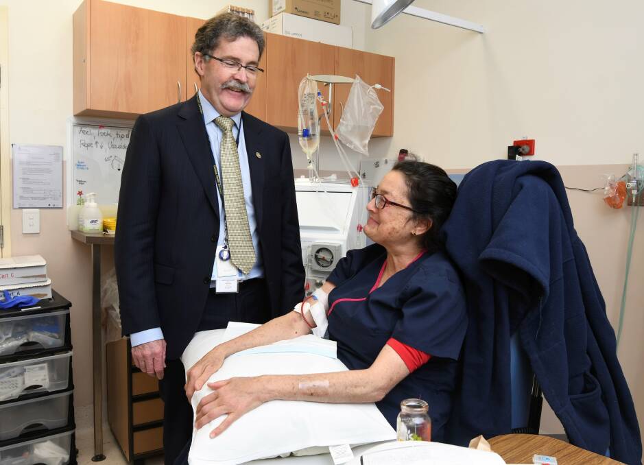 DIALYSIS: Assoc Prof John Richmond and Nairobi Saunders, who has dialysis overnight three times a week and works as a dialysis nurse during the day. Picture: Lachlan Bence