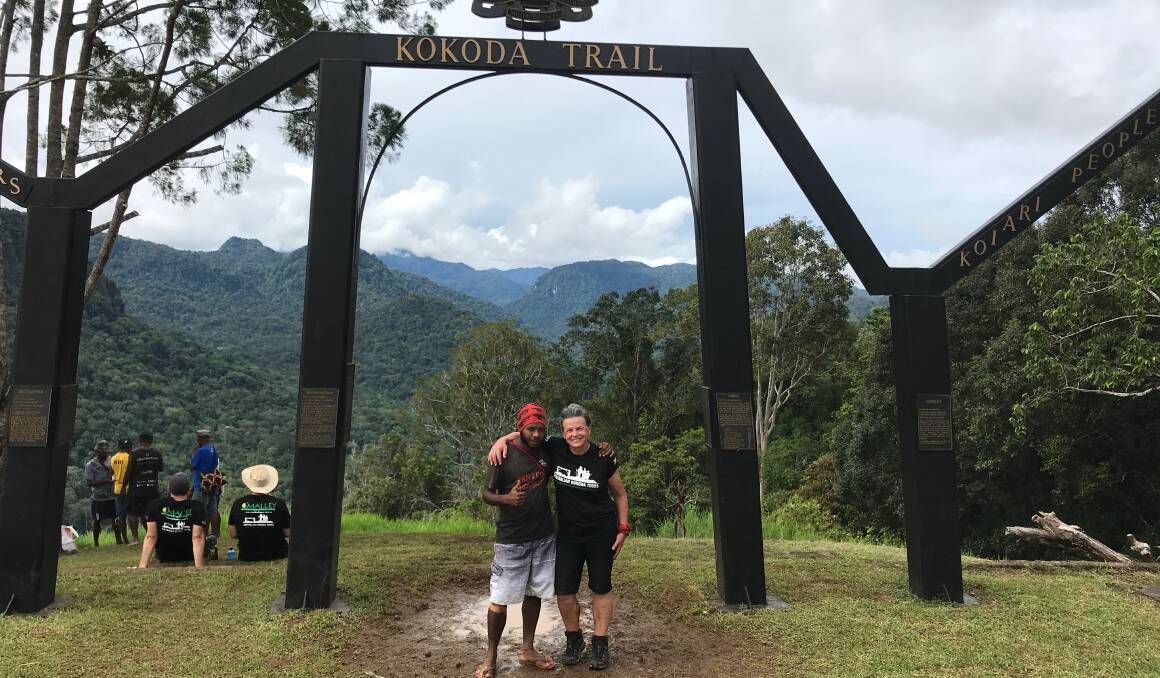 MEMORIAL: Porter Georgie and Liz Crothers at the Kokoda Track memorial.