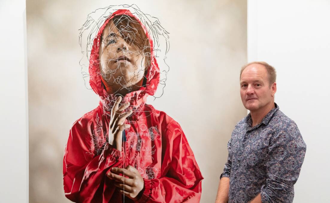 RESPONSE: Robert House with one of the evocative works from Out of the Darkness, which was created in response to the Royal Commission into Institutional Responses to Child Sexual Abuse. Picture: supplied