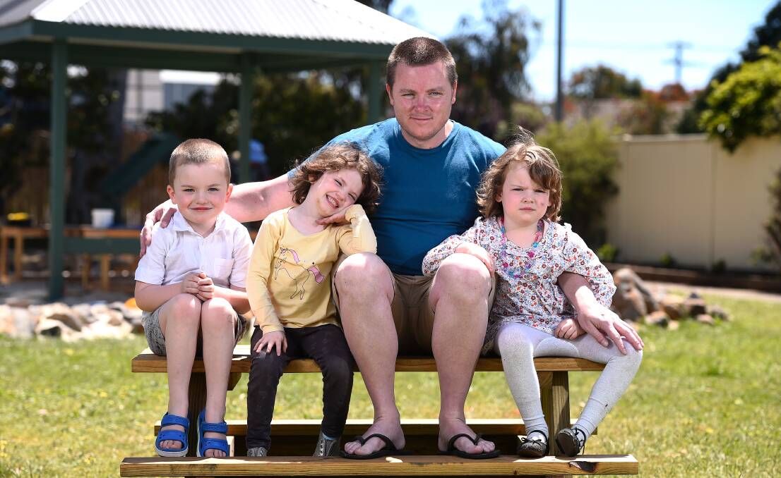 FAMILY TIES: Triplets Jacob, Molly and Amelia, 5, have followed in the footsteps of their uncle Gavin Bowler in attending the Delacombe Community Kindergarten, which is celebrating 40 years. Picture: Adam Trafford