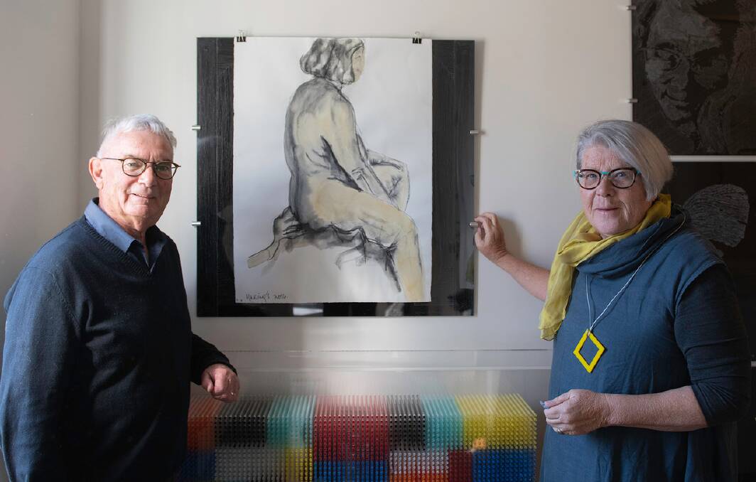 Ken and Lynne Makings pose in front of an art work that will be on display in their Armstrong St home for the 2019 SHAC ArtWalk. Picture: Ian Kemp