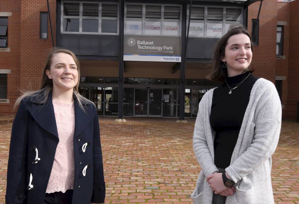 NEW PATHWAYS: Business trainees Nicole Costello and Lauren Salter are both working at schools while completing their traineeships. Picture: Lachlan Bence
