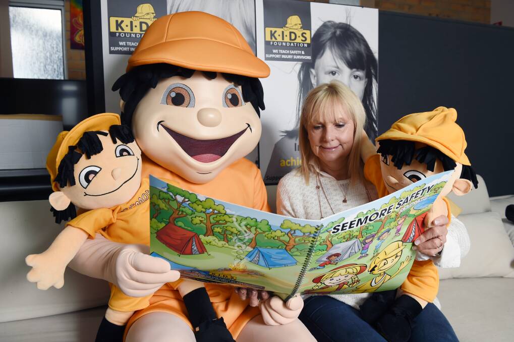 Kids Foundation founder Susie O'Neill and the organisation's safety mascot Seemore Safety.