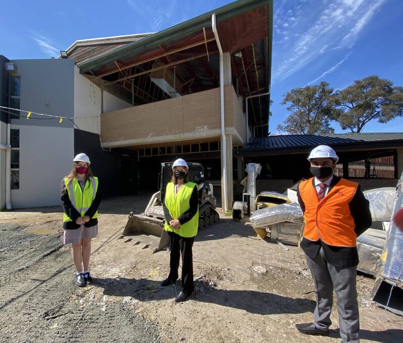 BUILD: Mount Clear College student Sabine Vissers, principal Lynita Taylor and student Garry Singh on the redevelopment site of Mount Clear College's junior school. Picture: Michelle Smith