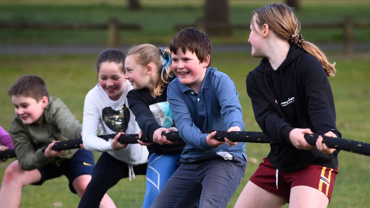 MUSCLE: Tug of war is one of the fun active games that trainer Melinda Sands uses to help get children working together and burning energy. Picture: Adam Trafford