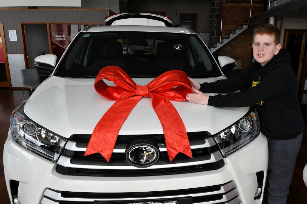 RAPT: The Dridan family's new Toyota Kluger was presented with a bow from Ballarat Toyota. Picture: Lachlan Bence
