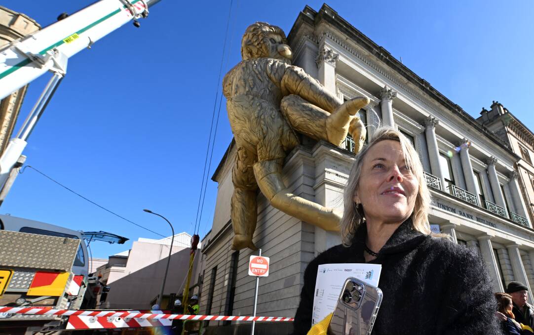 Artist Lisa Roet and her Golden Monkey when it was installed on the side of the National Centre for Photography ahead of the 2023 Ballarat International Foto Biennale. Picture by Lachlan Bence