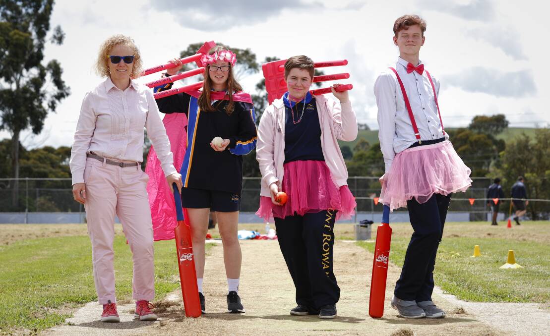 PINK: Mount Rowan principal Seona Murnane and students Jasmine Serno, Eric Cunningham and Coby Fontana get in to the spirit of Pink Stumps Day raising funds for the McGrath Foundation. Picture: Luke Hemer