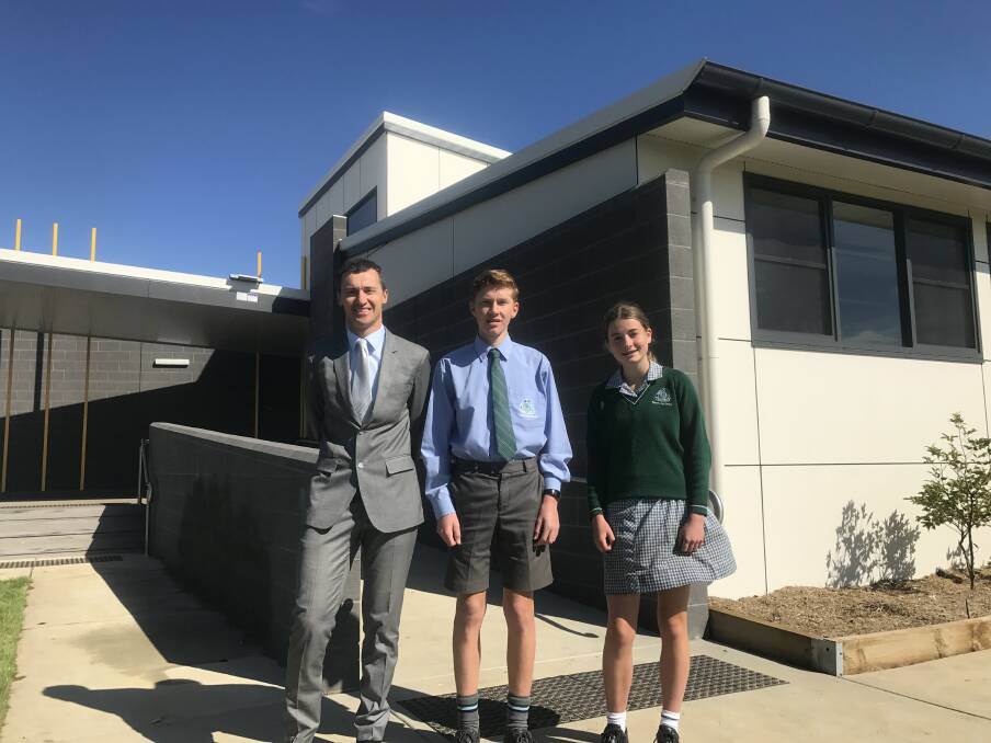 NEW START: Ballarat High School vice principal Shane Mathison with year nine students Adam and Molly outside the new year nine building. Picture: Michelle Smith