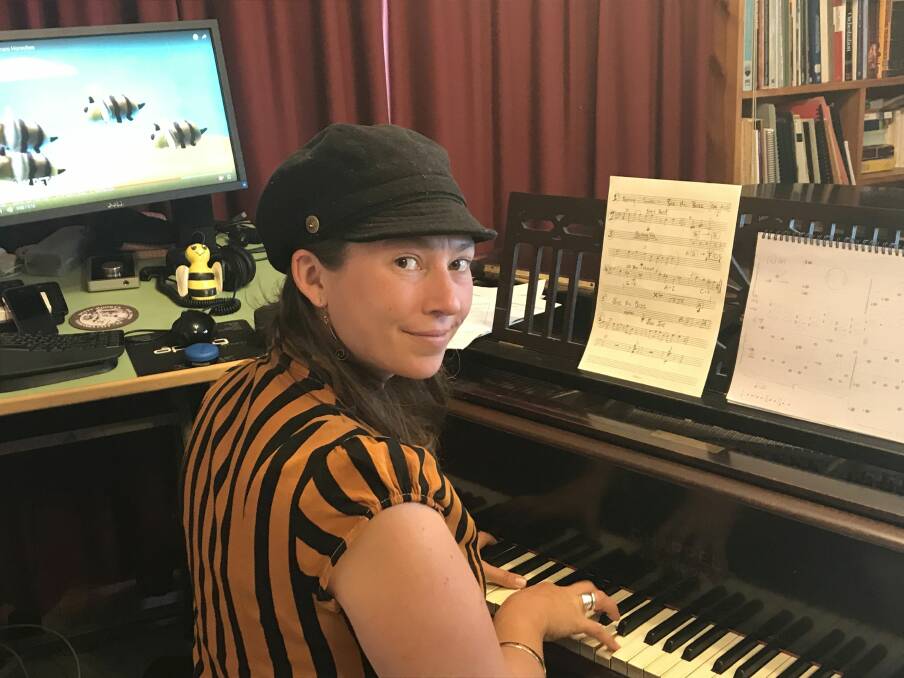 BUZZ: Rae Howell at home in Invermay working on her bee-inspired music for a string orchestra. Picture: Michelle Smith