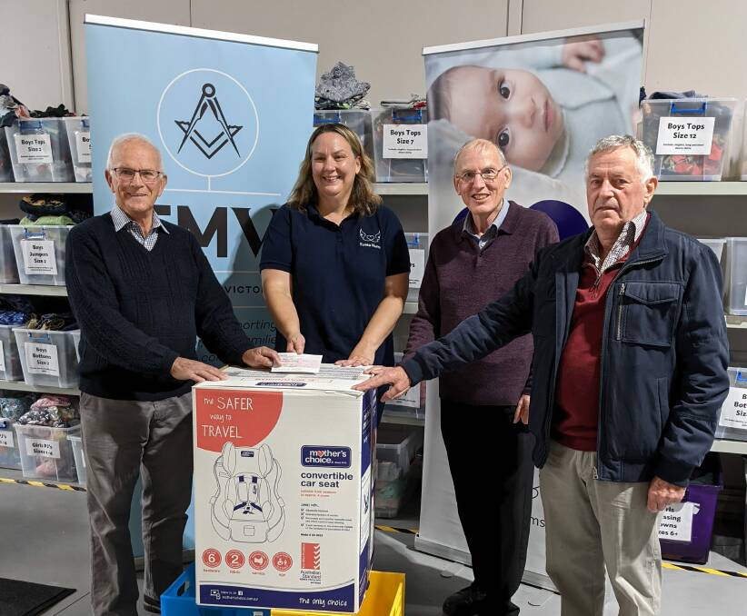DONATE: No. 23 Masonic Social Committee president Ken Jenkin, Eureka Mums operations manager Trinsa Lewis, No. 23 Masonic Social Committee secretary/treasurer Doug Williams, No. 23 Masonic Social Committee member Ian Judd at the cheque handover. Picture: supplied 