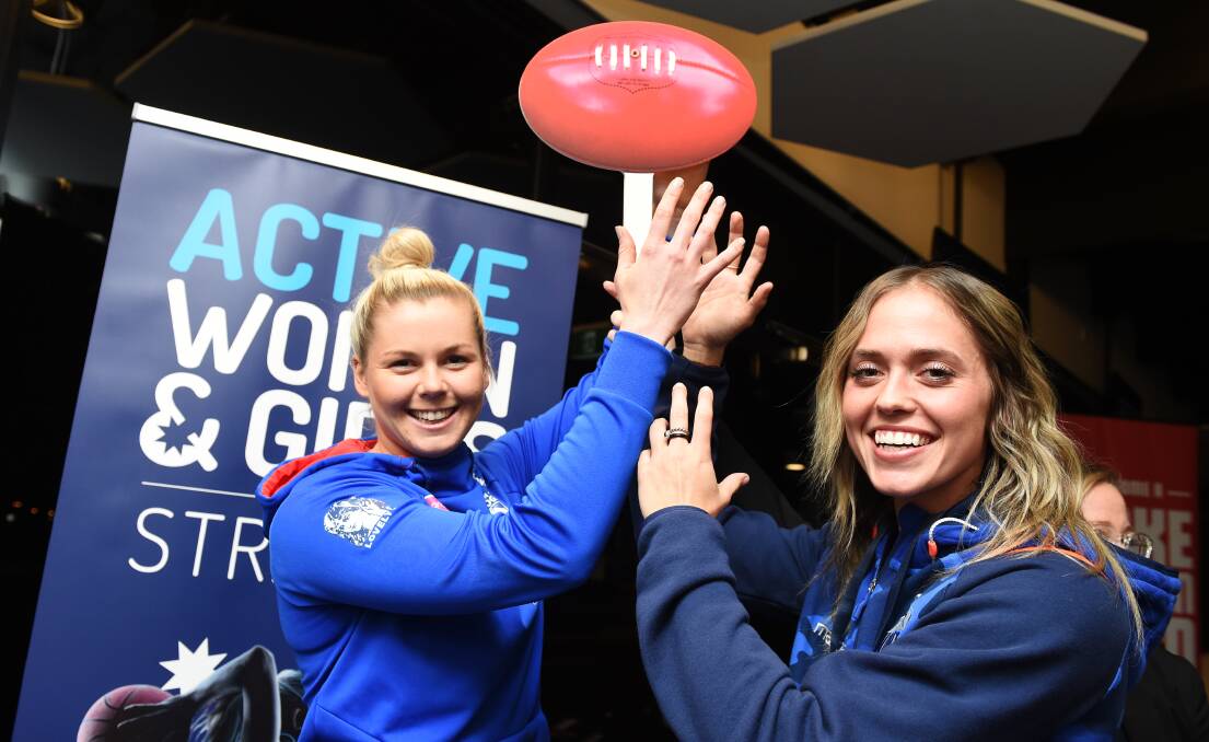 GET ACTIVE: AFLW footballers  Katie Brennan and Kaitlyn Ashmore at the launch of the 2018 Active Women and Girls strategy. Picture: Kate Healy