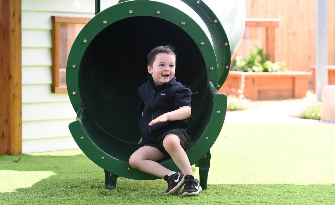 SLIDE: Carter explores the playground at the new Journey Early Learning Centre in Delacombe, which is due to open on January 31.