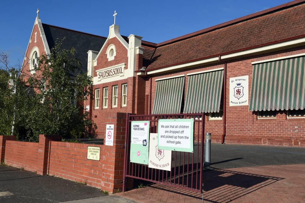 COVID SCARE: St Aloysius Catholic Primary School in Redan. Picture: Kate Healy