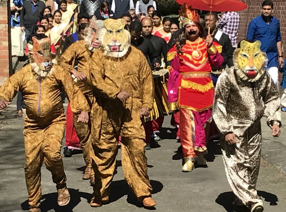 PARADE: Members of the Ballarat Malayalee Association form a procession in to St Patrick's Cathedral hall to celebrate the Onam festival. Picture: Michelle Smith