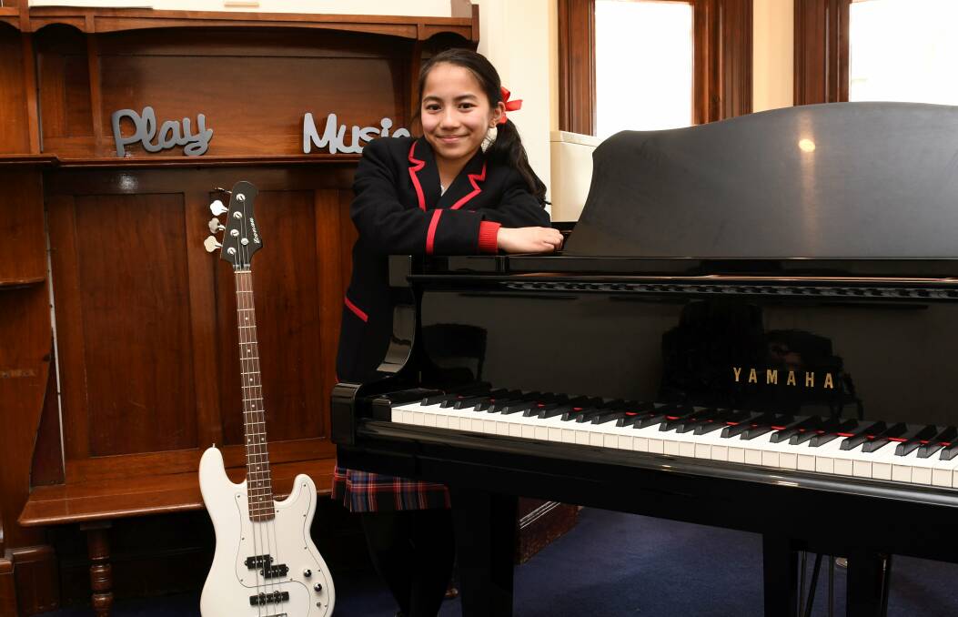 STAGE STAR: Chihana Perera will take the leap from her own school music room in to a school music room on the big stage when she appears in School of Rock. Picture: Lachlan Bence