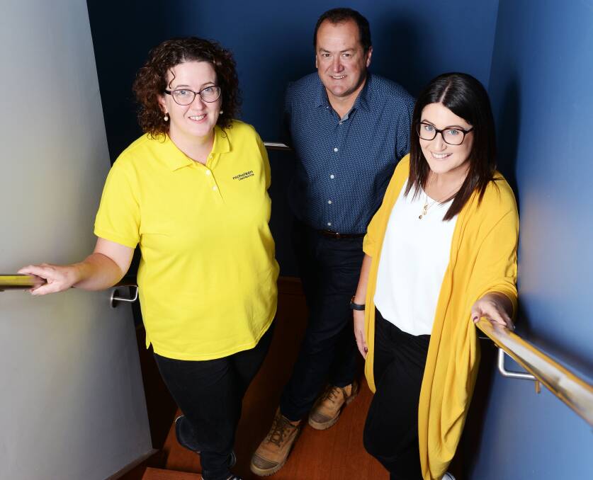 YELLOW: Bec Smail, Dean Stevens and Tansyn Dennett will hold an afternoon tea to raise awareness of endometriosis. Picture: Kate Healy.