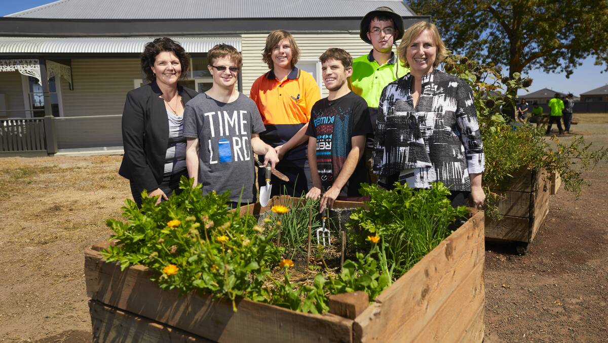 GREENING: Ballarat Group Training chief executive Mandy Macdonald, Joel Nuridin, Jacques Stone,  Rodney Donovan-Clancy, Nick Jacks and Pinarc chief executive Marianne Hubbard at the Pinarc Disability Support gardening project in Bonshaw.