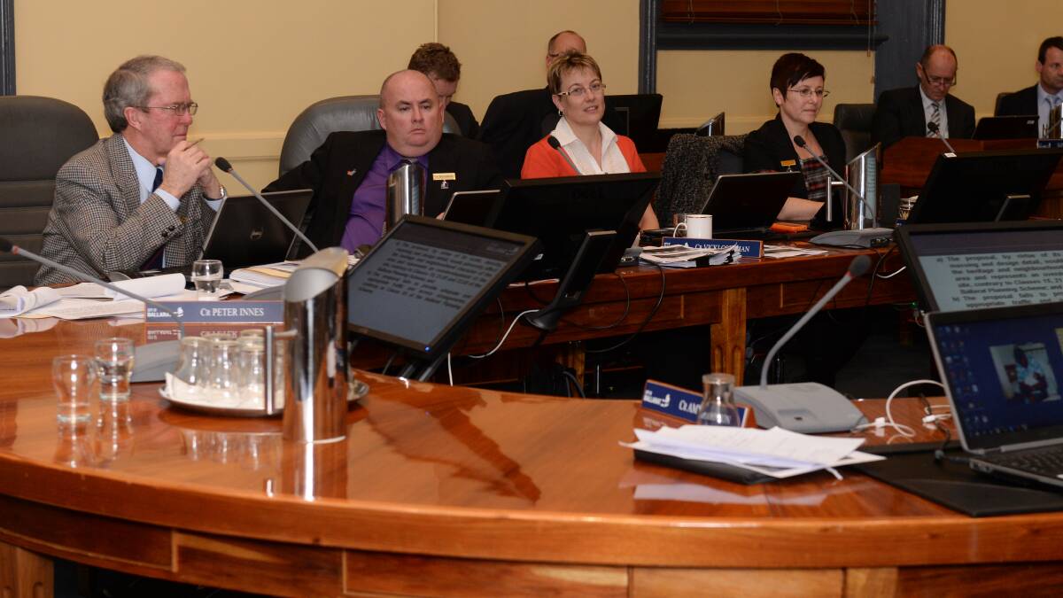 COUNCIL: Peter Innes in the Ballarat Council Chamber with Des Hudson, Vicky Coltman and Belinda Coates. 