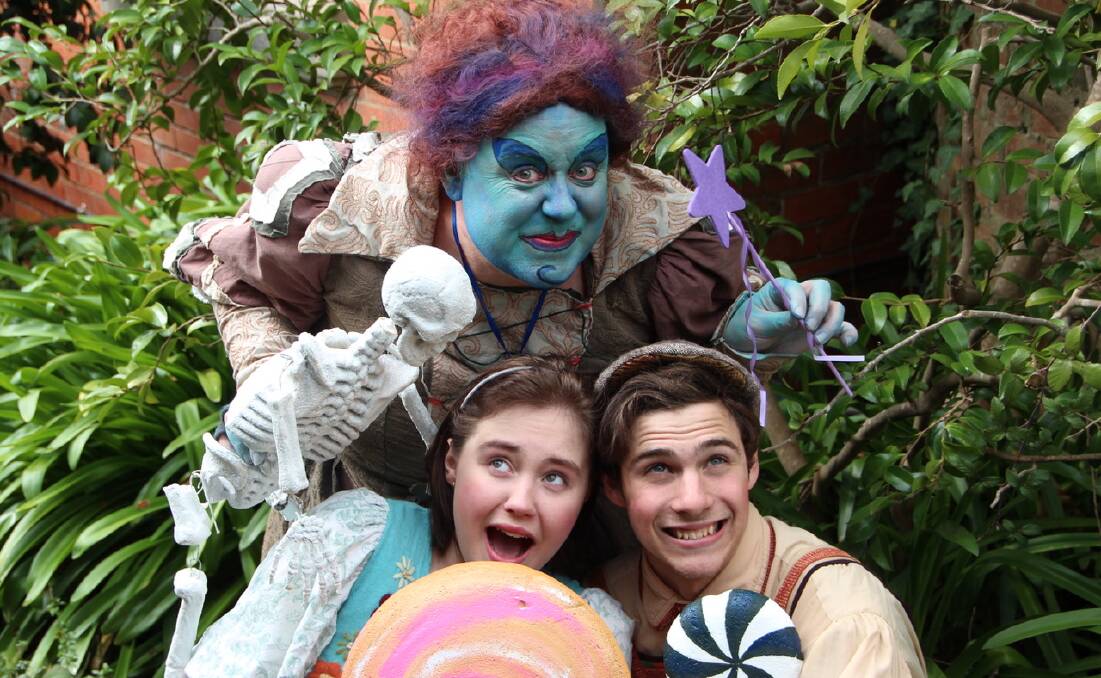 SCARY: Witch Adam Turnbull haunts Maddi Holland and Nick Oakes (Hansel and Gretel).
