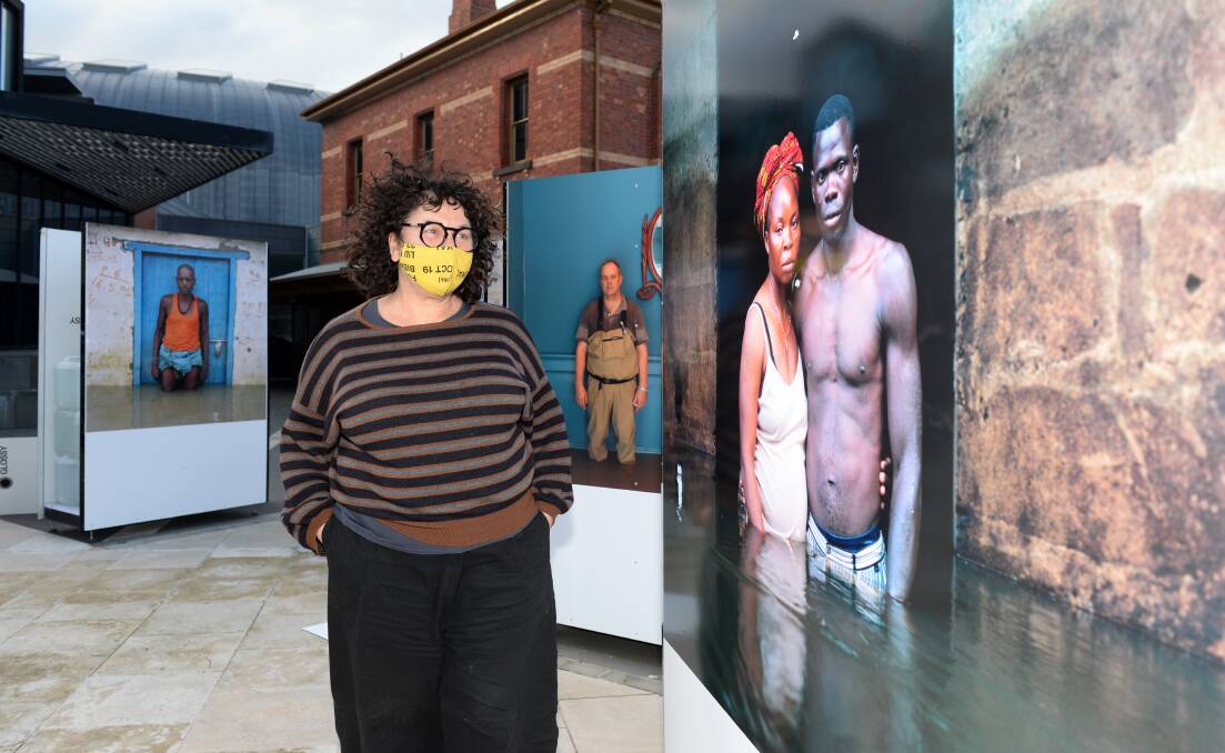 INSTALLATION: Ballarat International Foto Biennale artistic director Fiona Sweet with works installed over the weekend at Alfred Deakin Place. Picture: Kate Healy