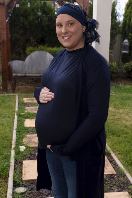 WAITING: Renee Jones does not want to find out the sex of her baby, preferring to wait for the surprise and using it to help her fight breast cancer. Picture: Lachlan Bence