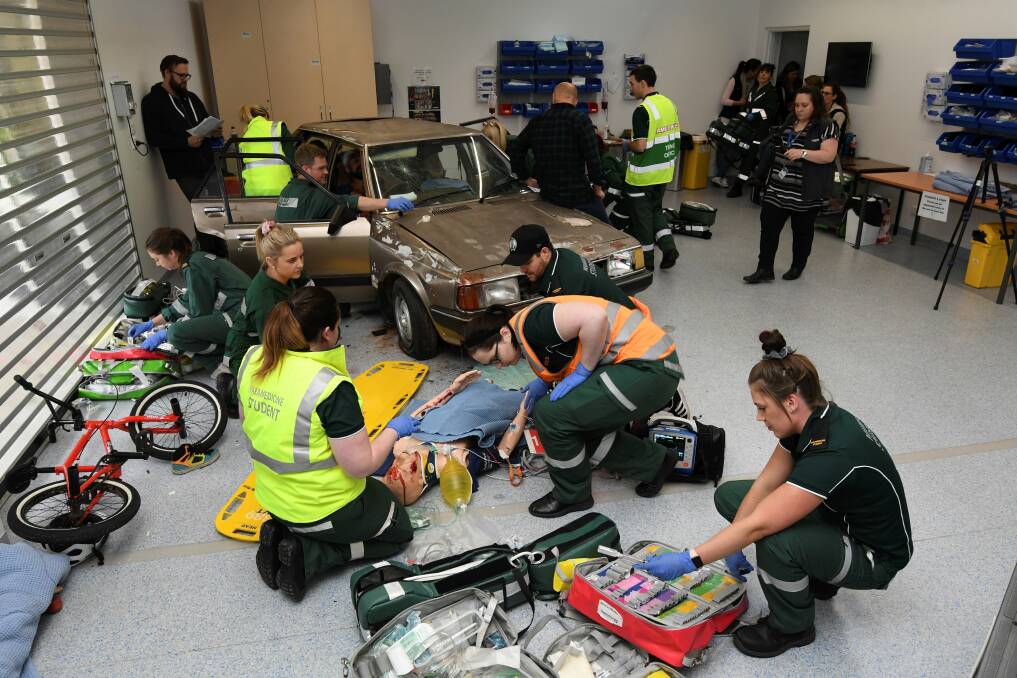 CHAOS: Student paramedics put their recent trauma management training to the test, taking charge of an accident scene.