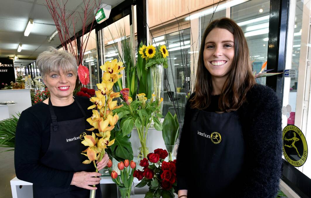 MISSED: Florist Jenny Burke and Kaitlyn Gunnell who did her apprenticeship with Ms Burke and worked with her for seven years