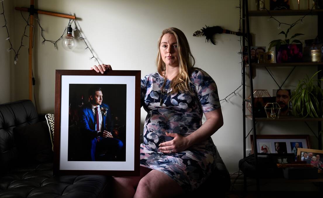 GRIEVING: Cassandra Hall with a picture of her late husband Alex, who died in February when she was six months' pregnant. Picture: Adam Trafford