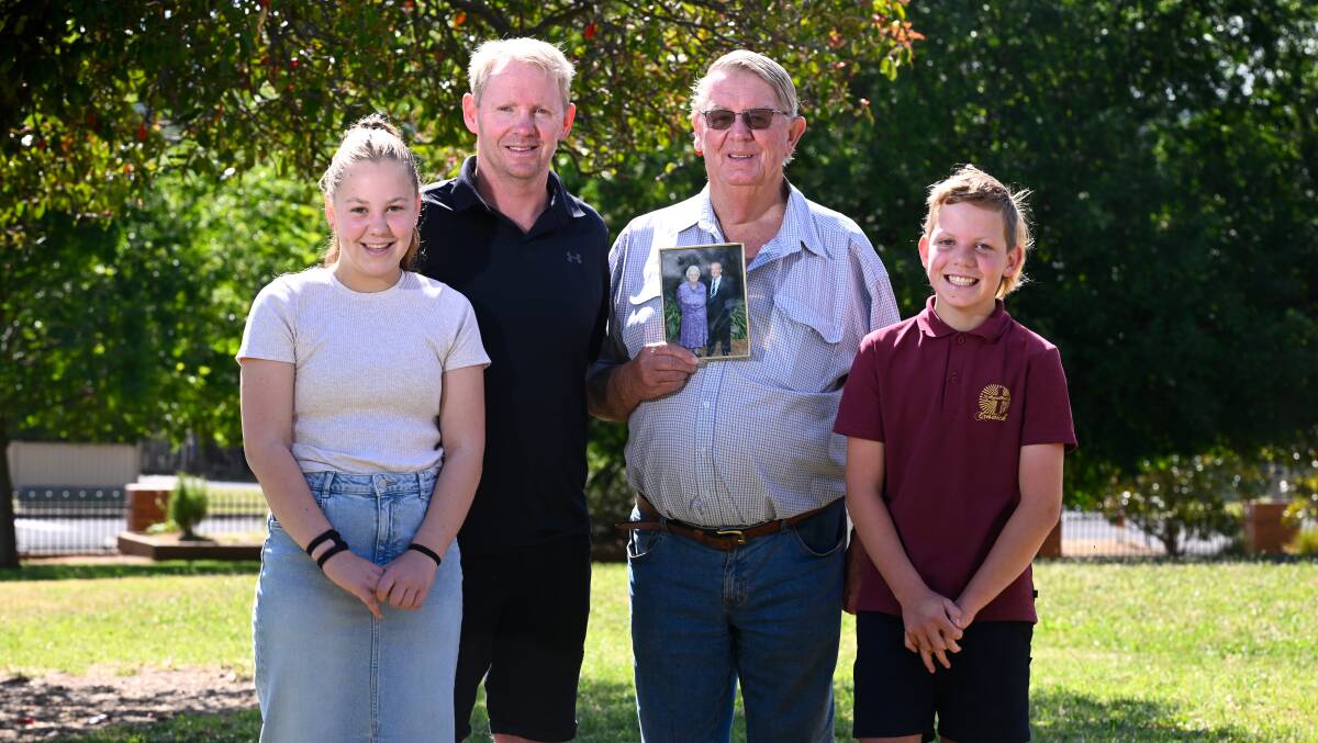 Four generations of the Preston family have attended St Augustine's Primary School in Creswick including Milla (2022 graduate), Andrew (1990 graduate), David (1957 graduate) holding a picture of his mother Mollie Rush (1932 graduate) and Oscar who is in grade five. Picture by Adam Trafford 