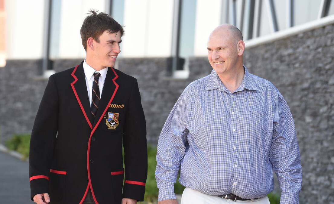 WALK: Nick Crellin and his father Andrew recount the night Nick saved his dad's life. Picture: Kate Healy