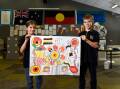ART: Woady Yaloak Primary School Koorie Club members Indy and Jordan with some of the artwork to be featured in the school's redevelopment. Picture: Adam Trafford