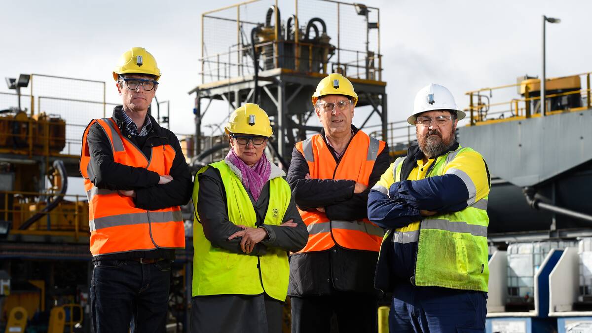 GOLD ROYALTY BITE: Minerals Council of Australia Victorian executive director James Sorahan, Gekko managing director Elizabeth Lewis-Gray, former Committee for Ballarat chair Nick Beale, and Castlemaine Goldfields Ballarat Gold Mine general manager Stephen Jeffers at the mine after the state government introduced a new gold royalty levy. Picture: Adam Trafford