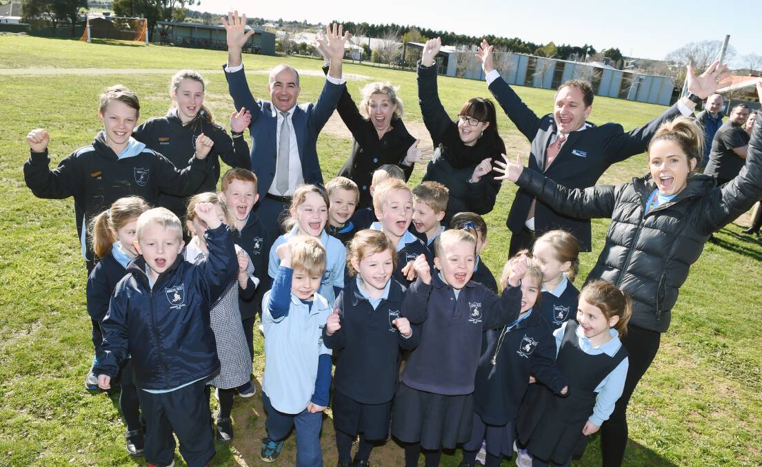 NEW SCHOOL: Education minister James Merlino celebrates at Miners Rest Primary School during the 2018 election campaign after promising to redevelop or rebuild the school. Picture: Kate Healy