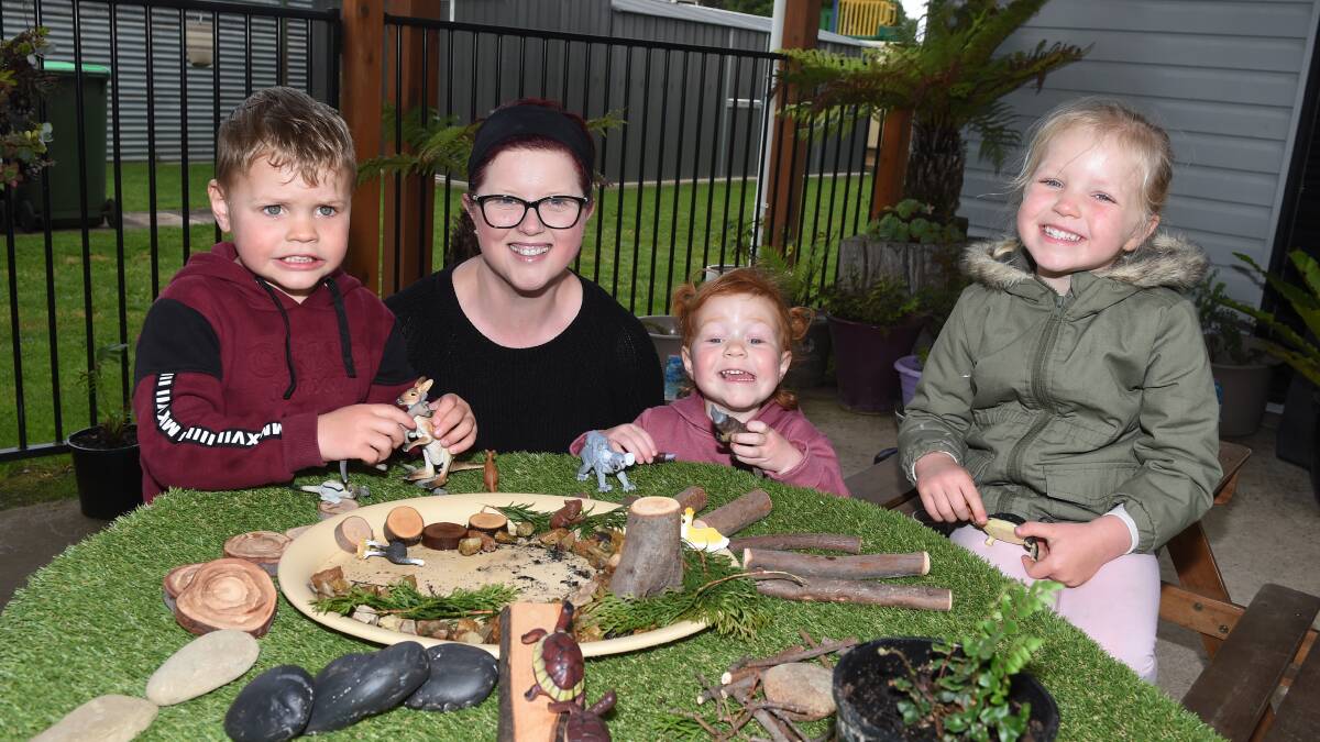 AWARDS: Family day carer Mel Dreger helps her young charges including Isaac, 4, Mia, 2 and Abby, 4, to explore their interests. Picture: Kate Healy