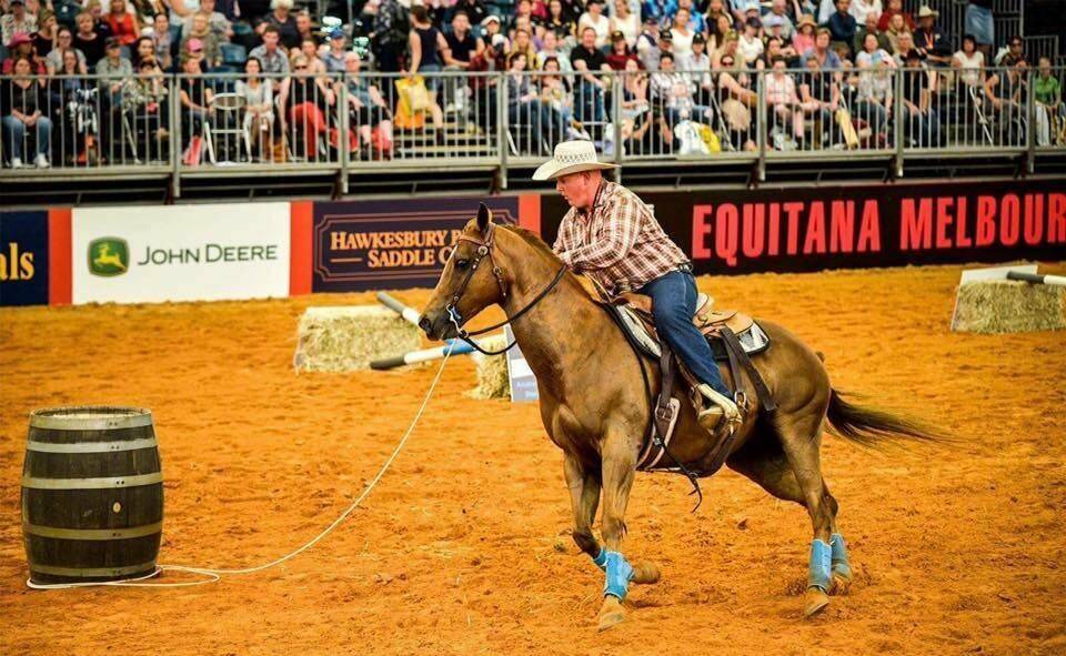 RIDING SKILLS: Shane Woodall and his horse Dolly tackle a roping element on an extreme cowboy course. Picture: 42beats.com 